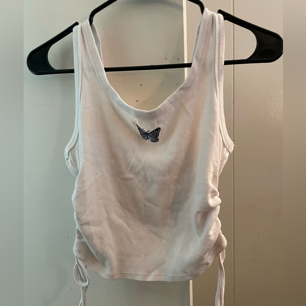 White tank top with butterfly design